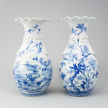 A matched pair of blue and white vases, Japan, early 20th Century.