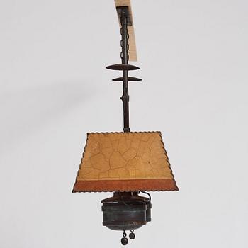 Nordiska Kompaniet, a patinated metal ceiling light for a Swedish "Sportstuge" interior, 1930's.