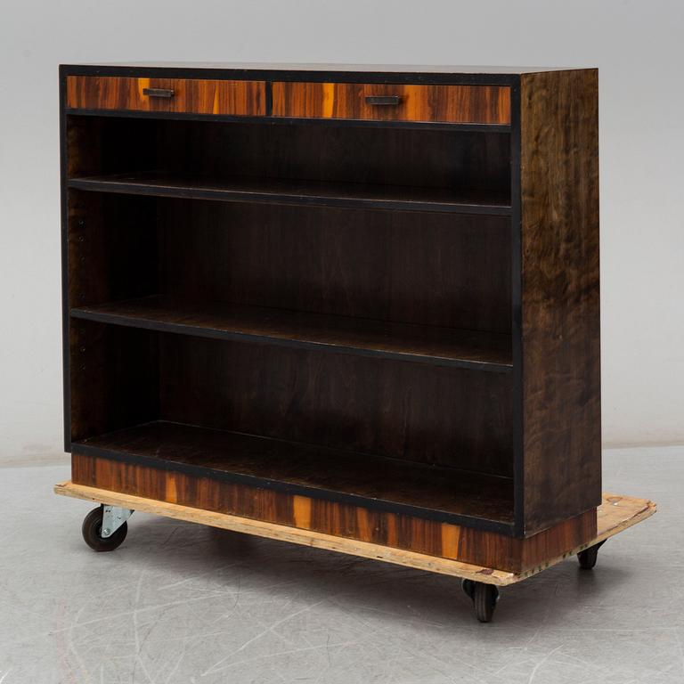 a 1930's stained birch bookshelf.