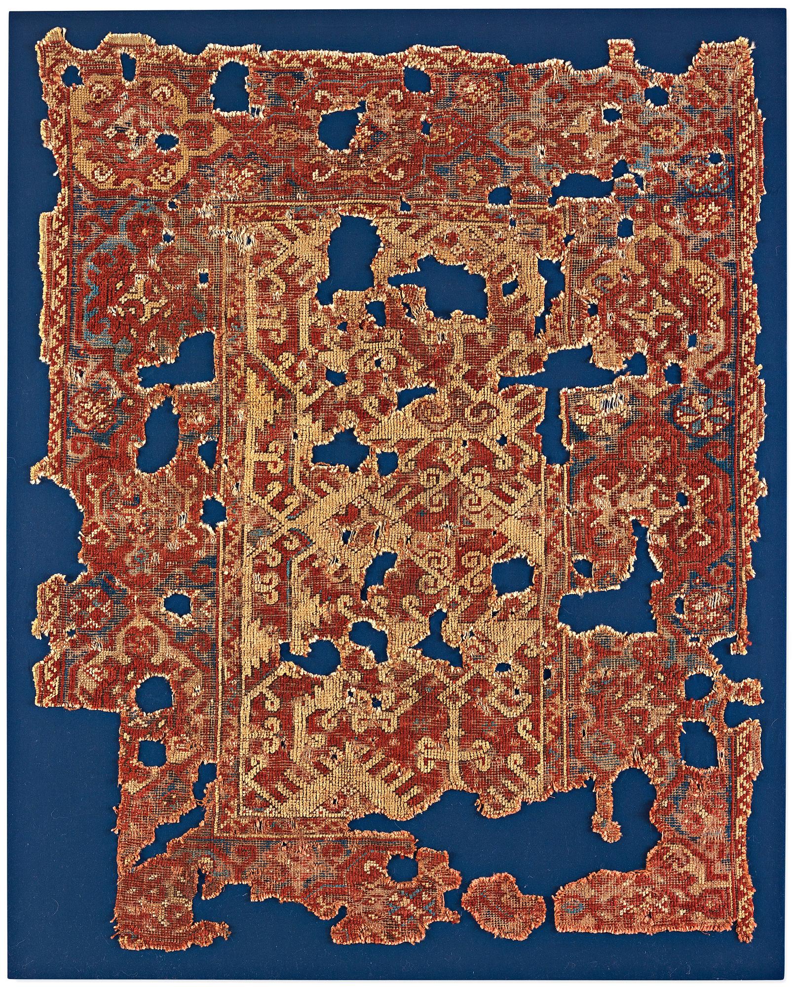 Mattfragment, antik, Västanatolisk "Lotto", 1600-tal, ca 142 x 115 cm (inklusive ram 155 x 124 cm).