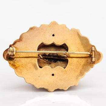 A 14K gold brooch with enamel. Kello-Tuomi Oy, Helsinki 1969.