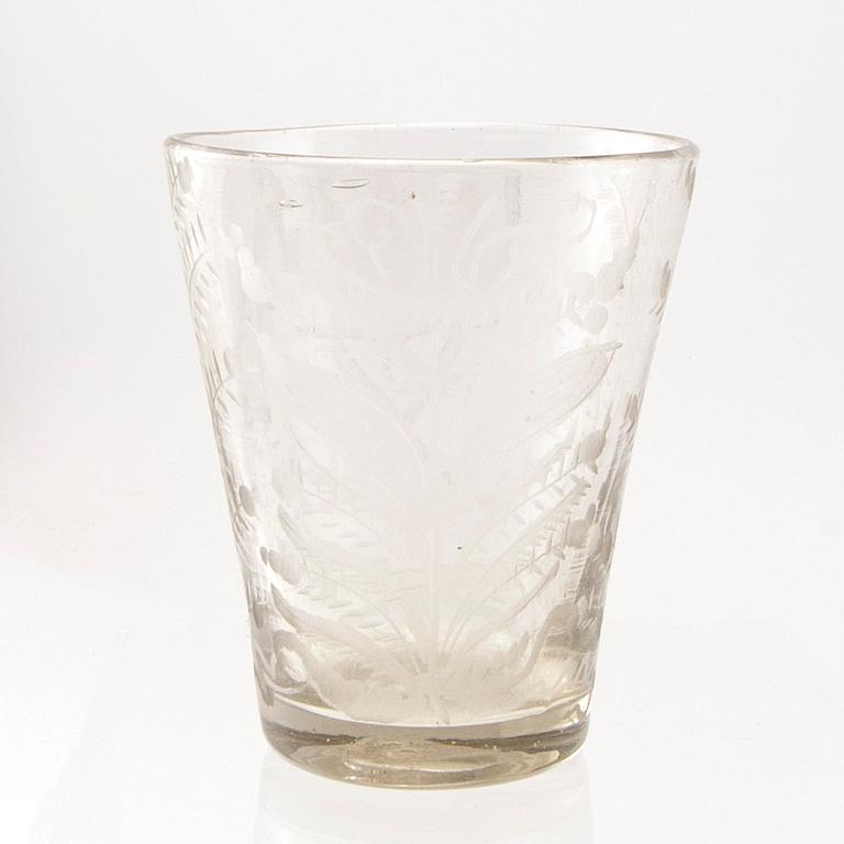 A Swedish glass beaker with the monogram of King Fredrik I, Henrikstorps glass manufactory, early 18th century.