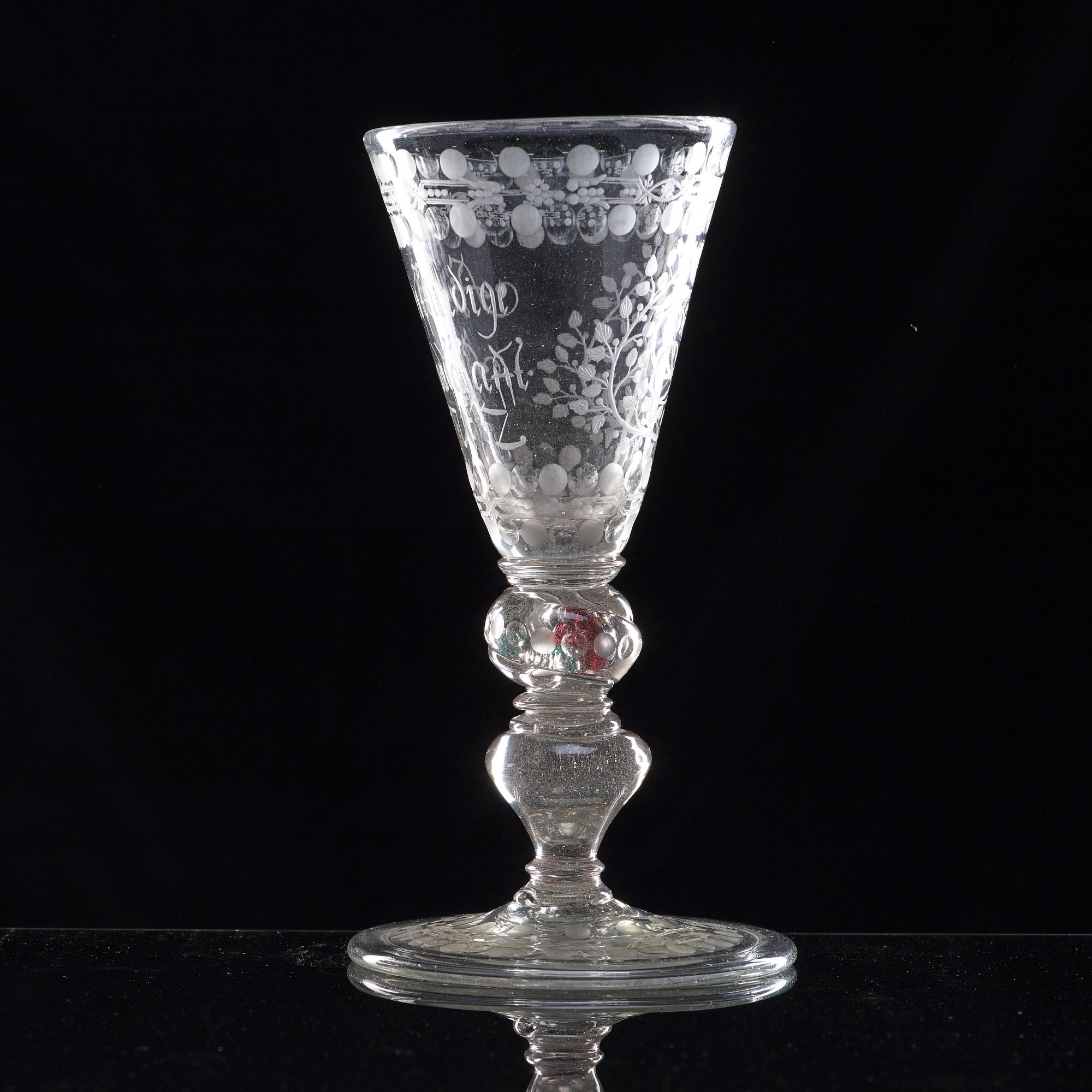 A German cut and engraved glass goblet, 18th Century.