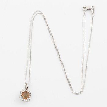 Necklace with orange-brown rose-cut sapphire and brilliant-cut diamonds.