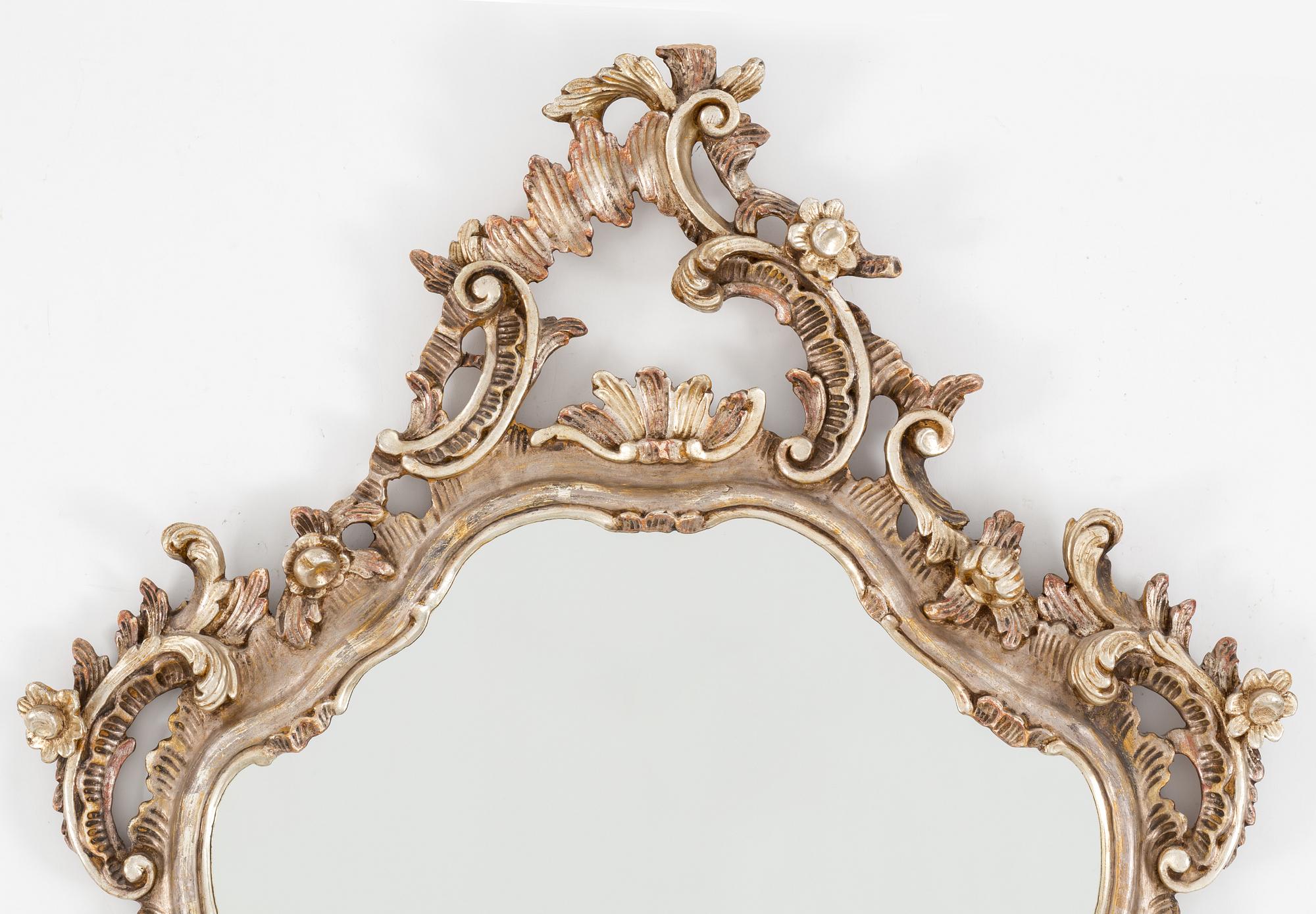 A Rococo style mirror, mid 20th Century.