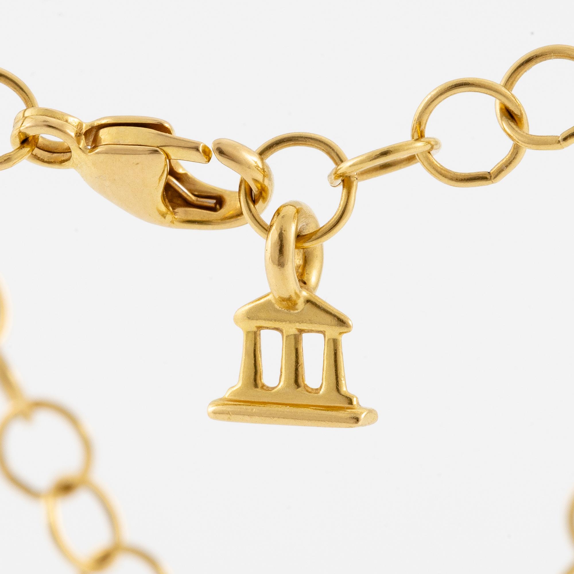 Pendant with chain in 18K gold featuring rock crystal and round brilliant-cut diamonds, Temple St Clair.