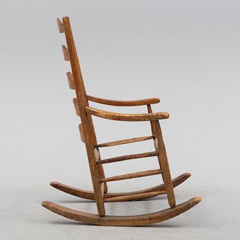 A 18th/19th century rocking chair.