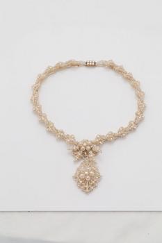 A late Georgian/early Victorian woven seed pearl necklace, probably English.