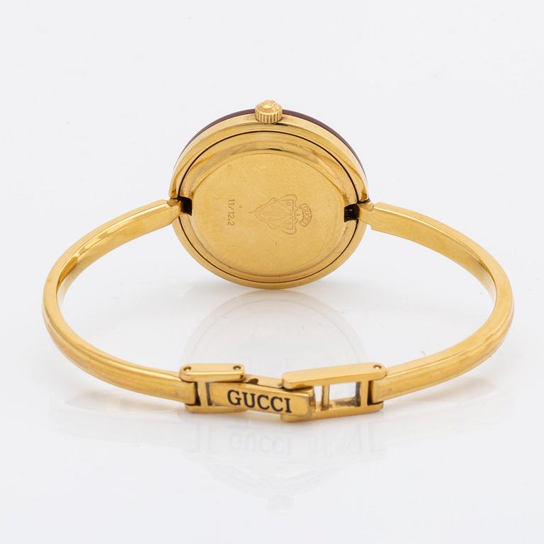 GUCCI armbandsur, 23 mm, metall, quartz, med 12 utbytbara ringar i plast, originaletui.