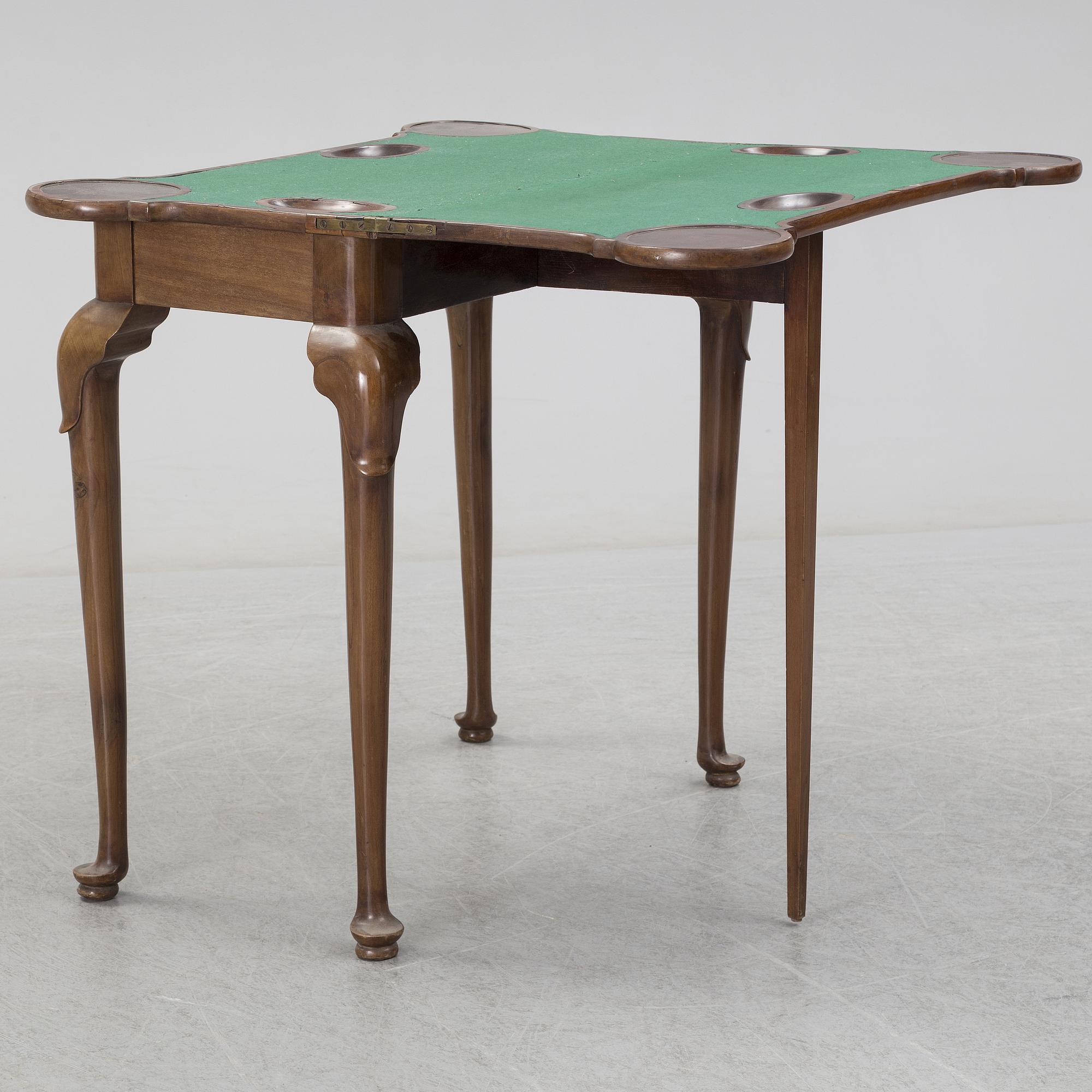 A mahogany games table, 18th Century.