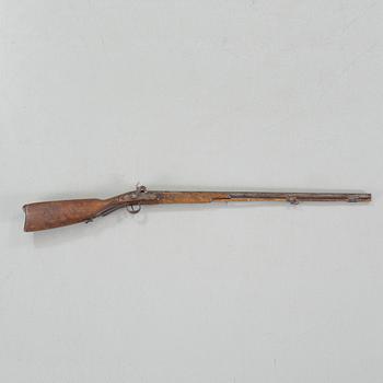 A percussion rifle, around the mid 19th century.