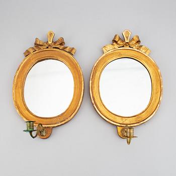 A pair of girlandole one light mirrors, Gustavian style, presumably early 20th Century.