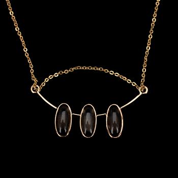 HALSSMYCKE, guld 14K, rökkvartser, Elis Kauppi, Kupittaan Kulta. 1900-talets senare hälft. Vikt 4,4 g.