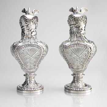 A pair of flamboyant and unusual large silver and cut-glass decanters by Wilhelm Bolin Moscow 1912-1917.