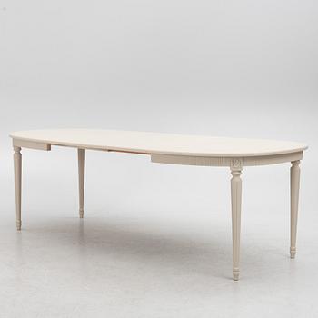 A Gustavian Style Dining Table and 10 Chairs, second half of the 20th Century.