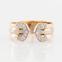 Cartier, Ring "Double C" in 18K three-colour gold and round brilliant-cut diamonds.