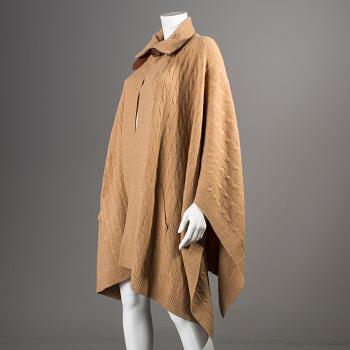 A beige wool-and cashmere poncho by Ralph Lauren.