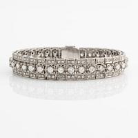 Bracelet in platinum with round brilliant and eight-cut diamonds.