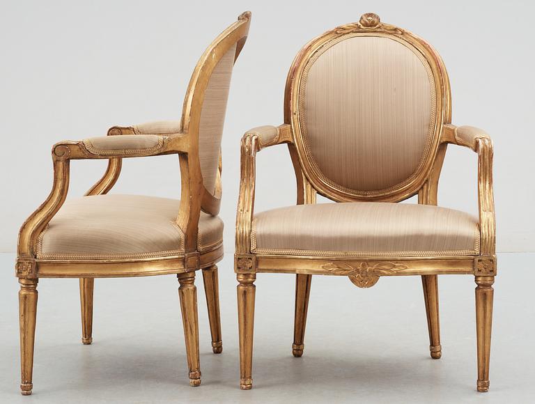 A pair of Gustavian late 18th century armchairs.