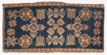 An embroidered carriage cushion, c. 93 x 45 cm, Torna or Bara district, Scania signed BID.