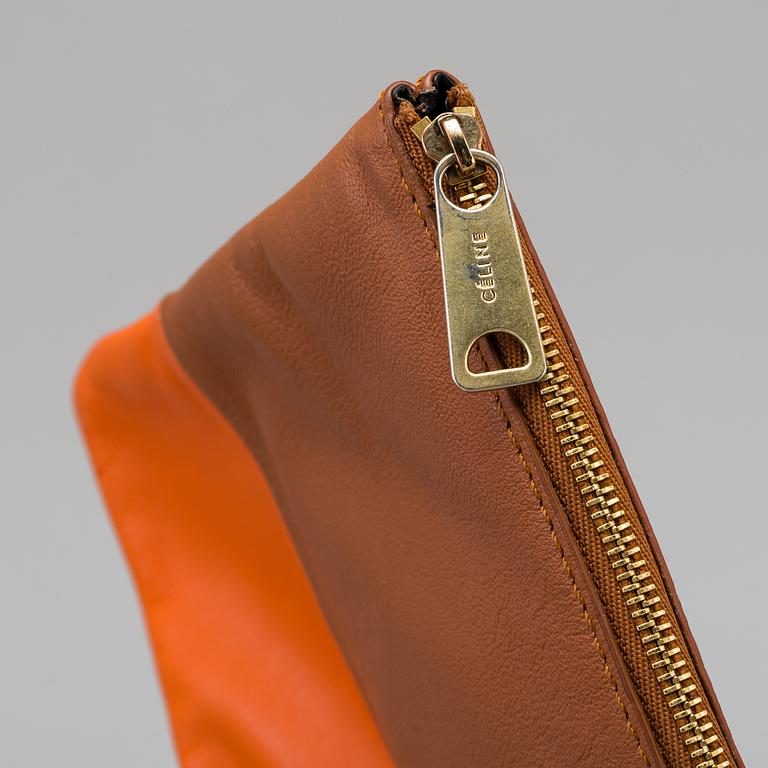 A leather Céline clutch.