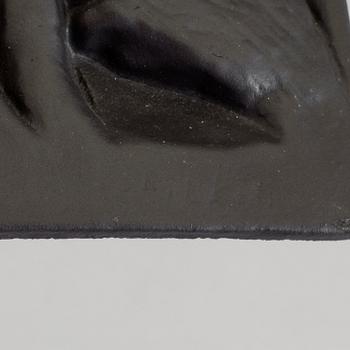 MICHAEL SCHILKIN, a cast iron plaque "See no evil, hear no evil, say no evil", signed and dated Högfors 1961.