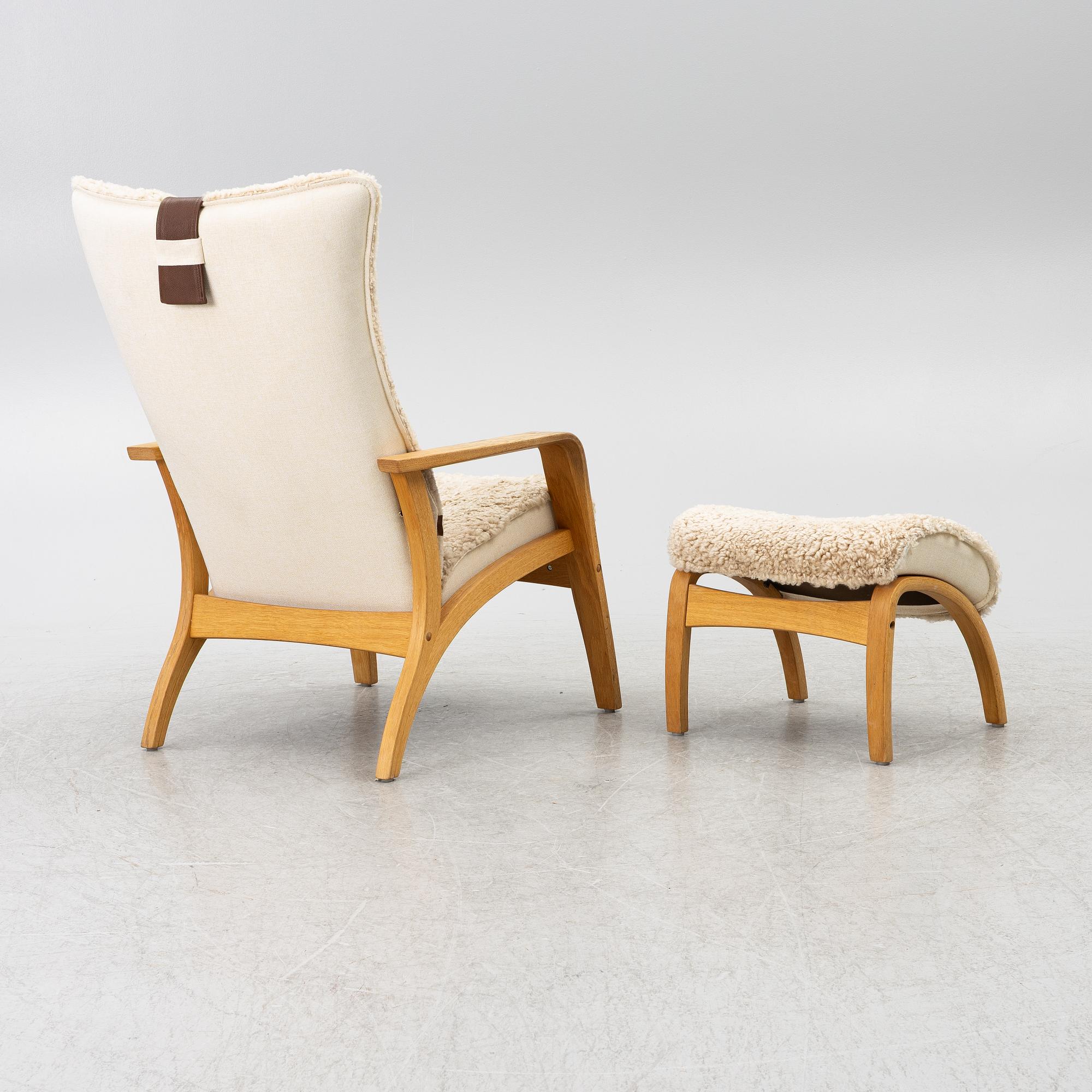A 'Delta Adventure' armchair with footstool, Brunstad AS, Norway.
