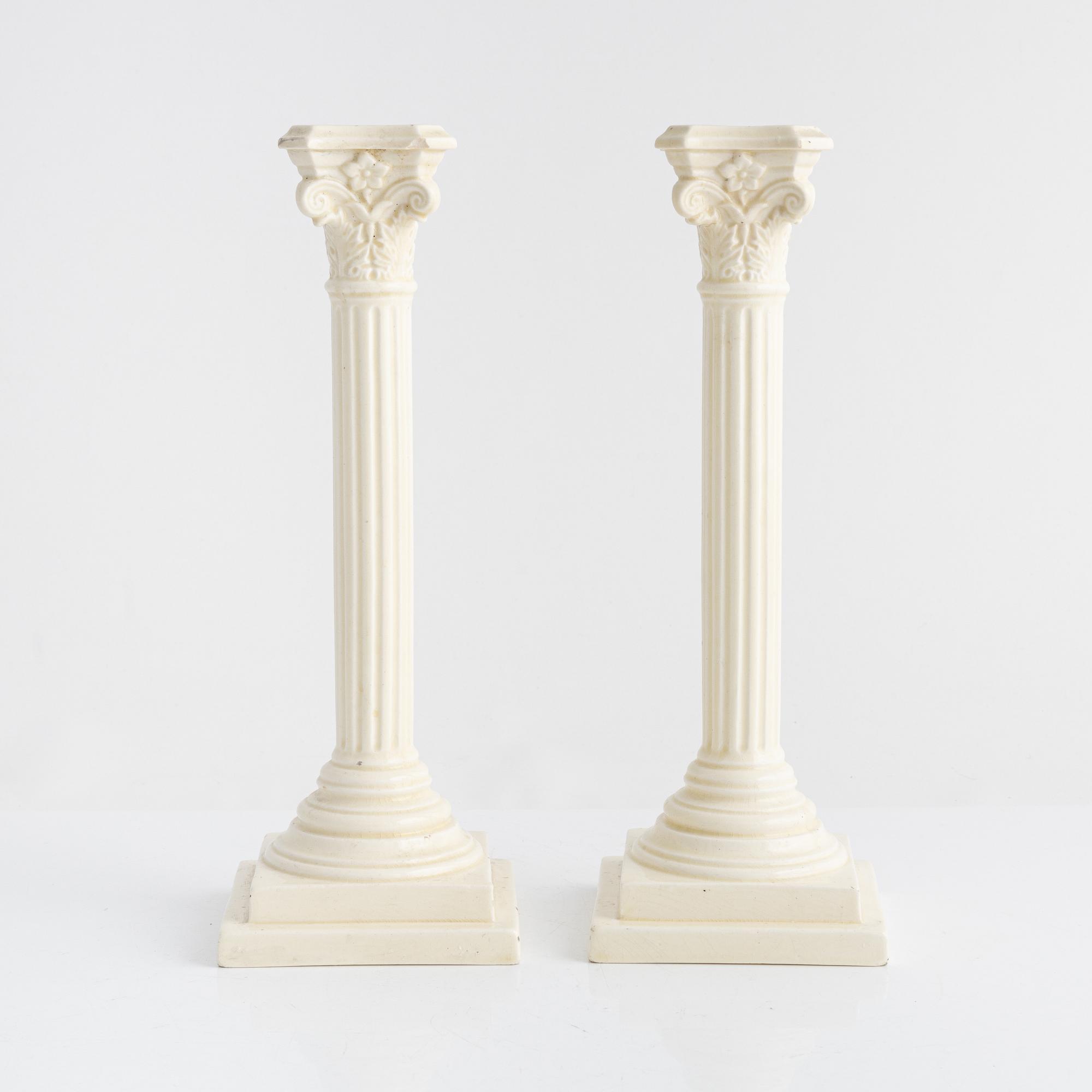 A pair of creamware candlesticks, around 1900.