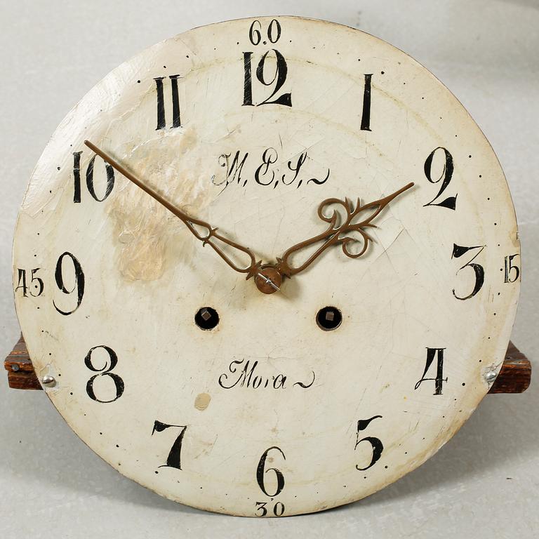 A grandfather clock dated 1823.