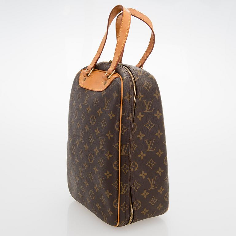 LOUIS VUITTON Monogram Canvas Excursion Bag.