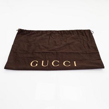 Gucci, a 'Denim Soho Chain Tote' bag.