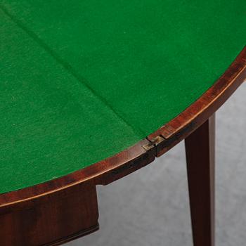 A pair of George III demi-lune mahogany card tables, first half of the 19th Century.