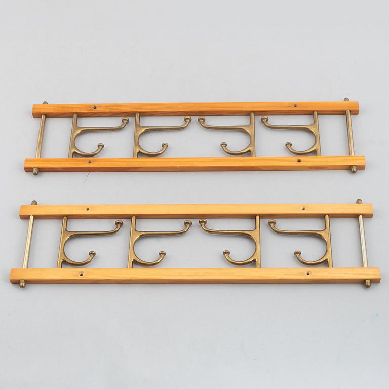 A pair of 'Dekorativ' coat hangers, Skoglunds metallgjuteri, Anderstorp, 1950's/60's.