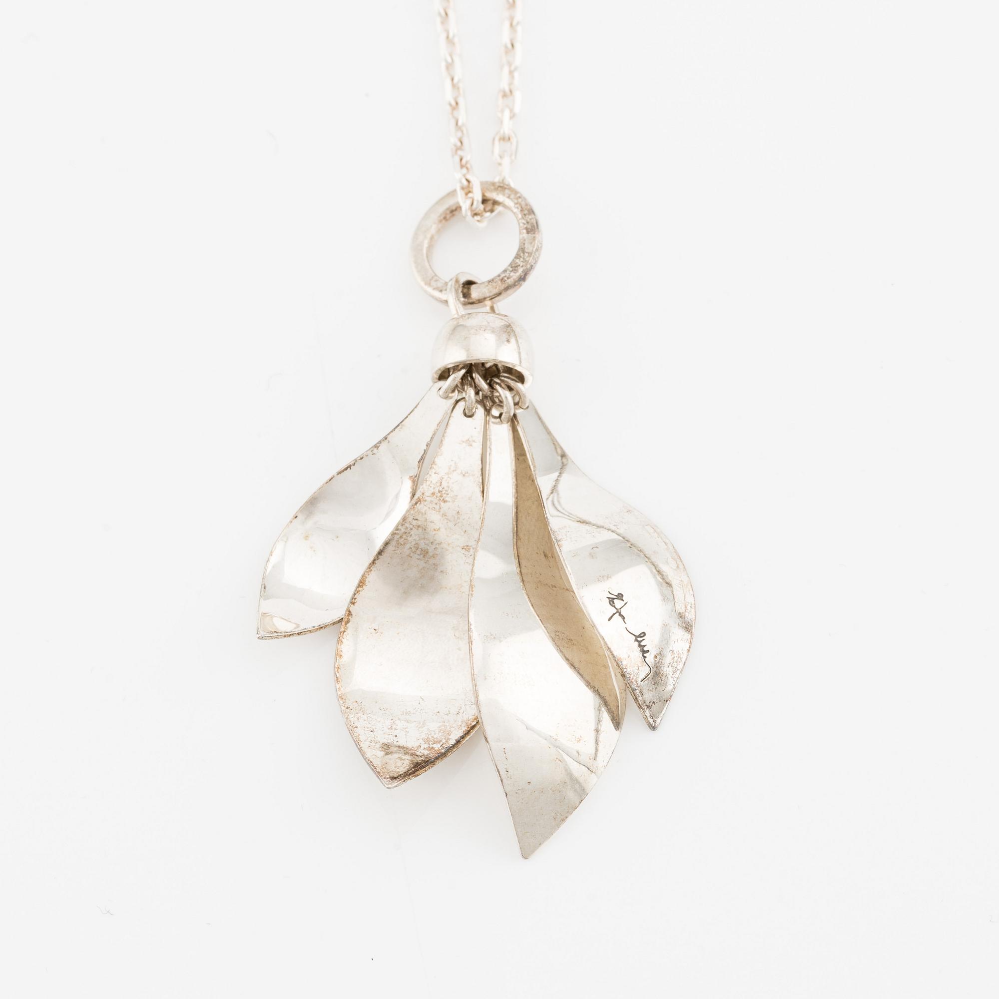 Efva Attling, a pair of earrings, and two collar/brooches, silver.