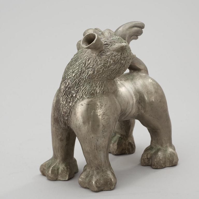 An Anna Petrus pewter bottle in the shape of a lion, Herman Bergman, Stockholm 1923-25.