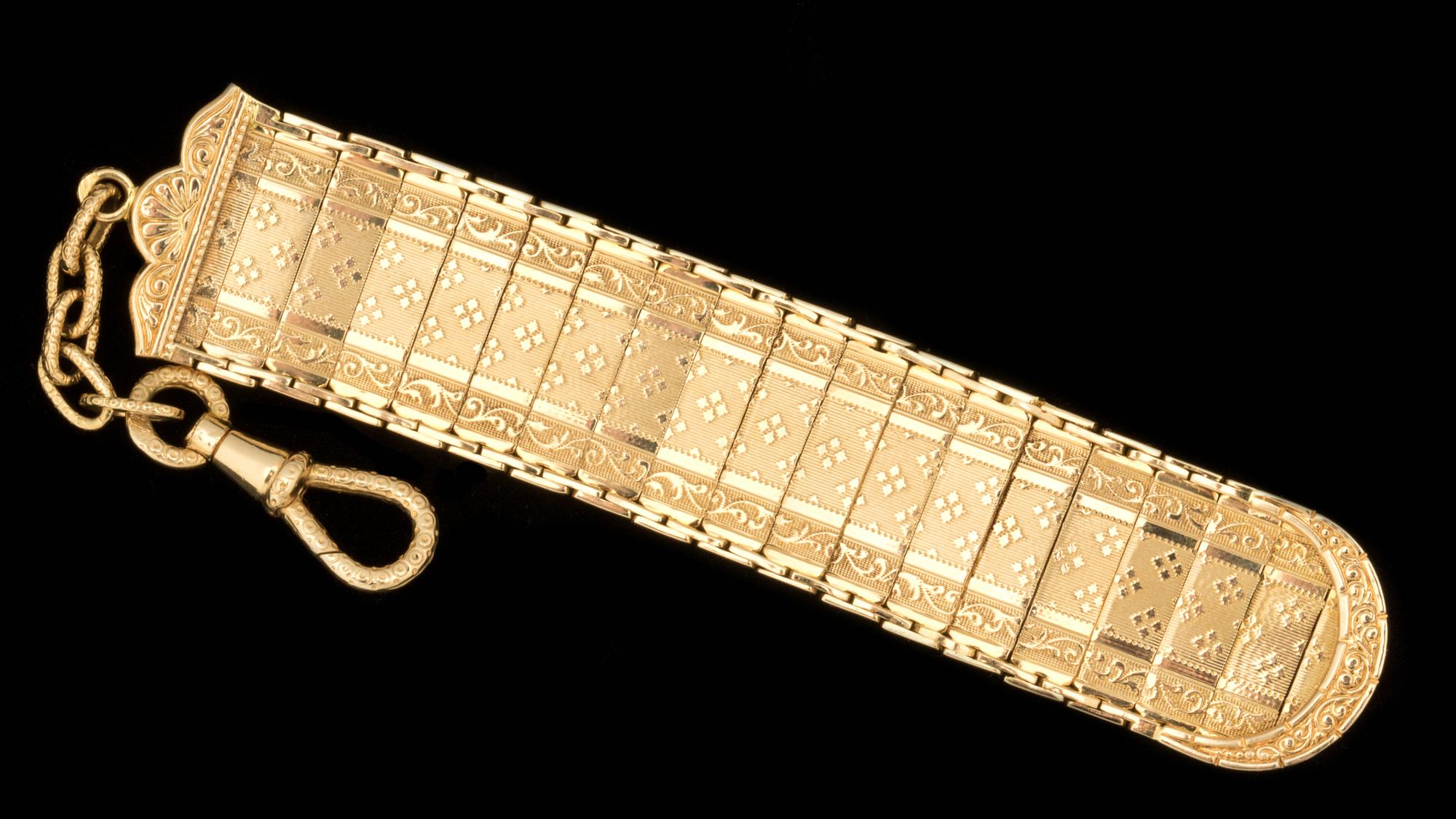 CHATELAINE, 18 k guld. Vikt ca 14 g.