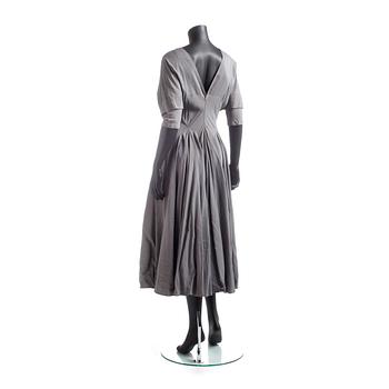 ALAÏA, a grey dress.