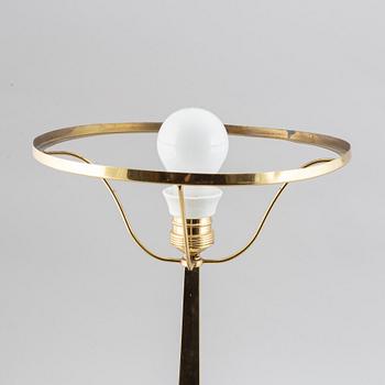 An Art Nouveau brass table lamp, early 20th century.