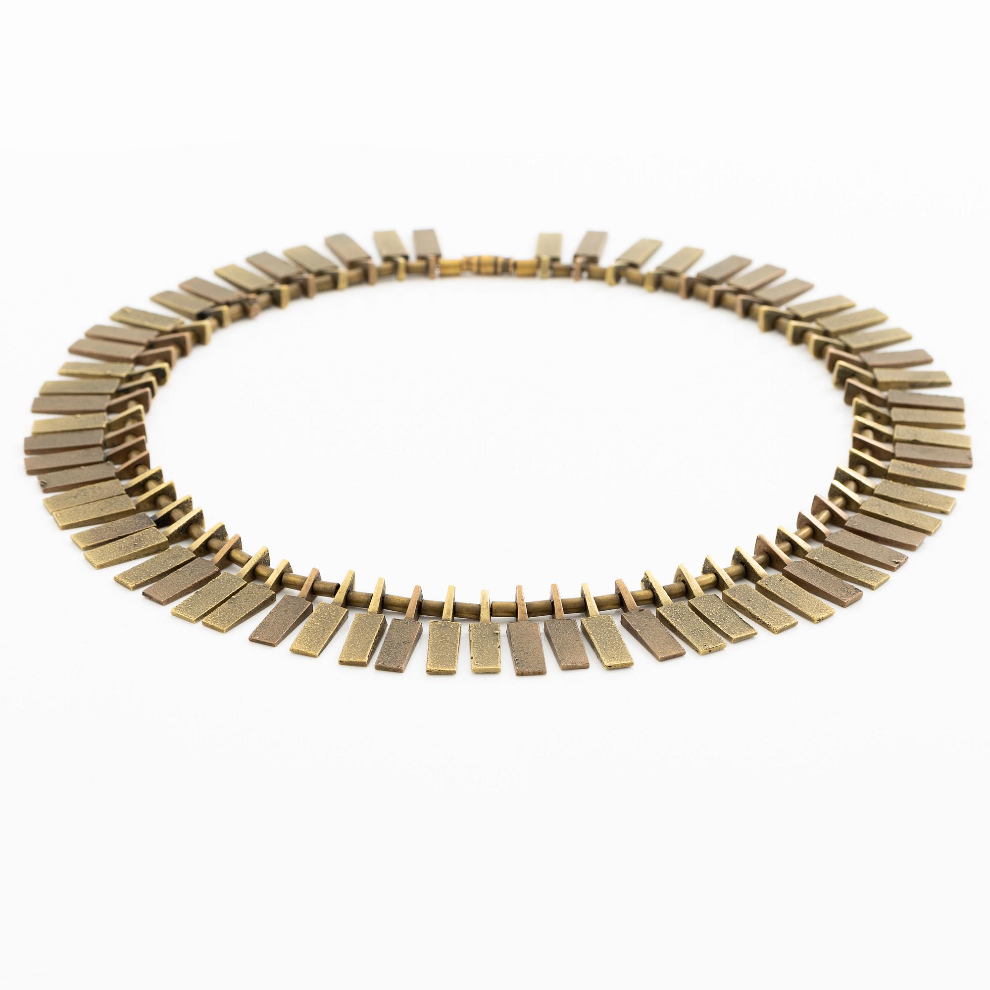 Inga-Britt "Ibe" Dahlquist, a necklace "Nefertiti", bronze.