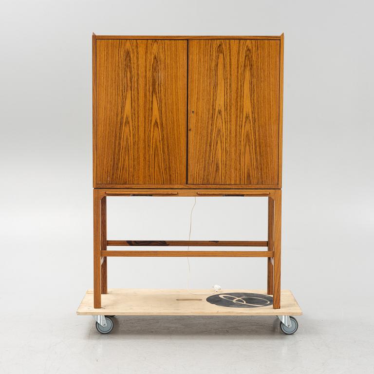 A mid 20th century bar cabinet.