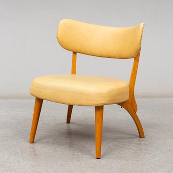 an armchair from the mid 20th century.