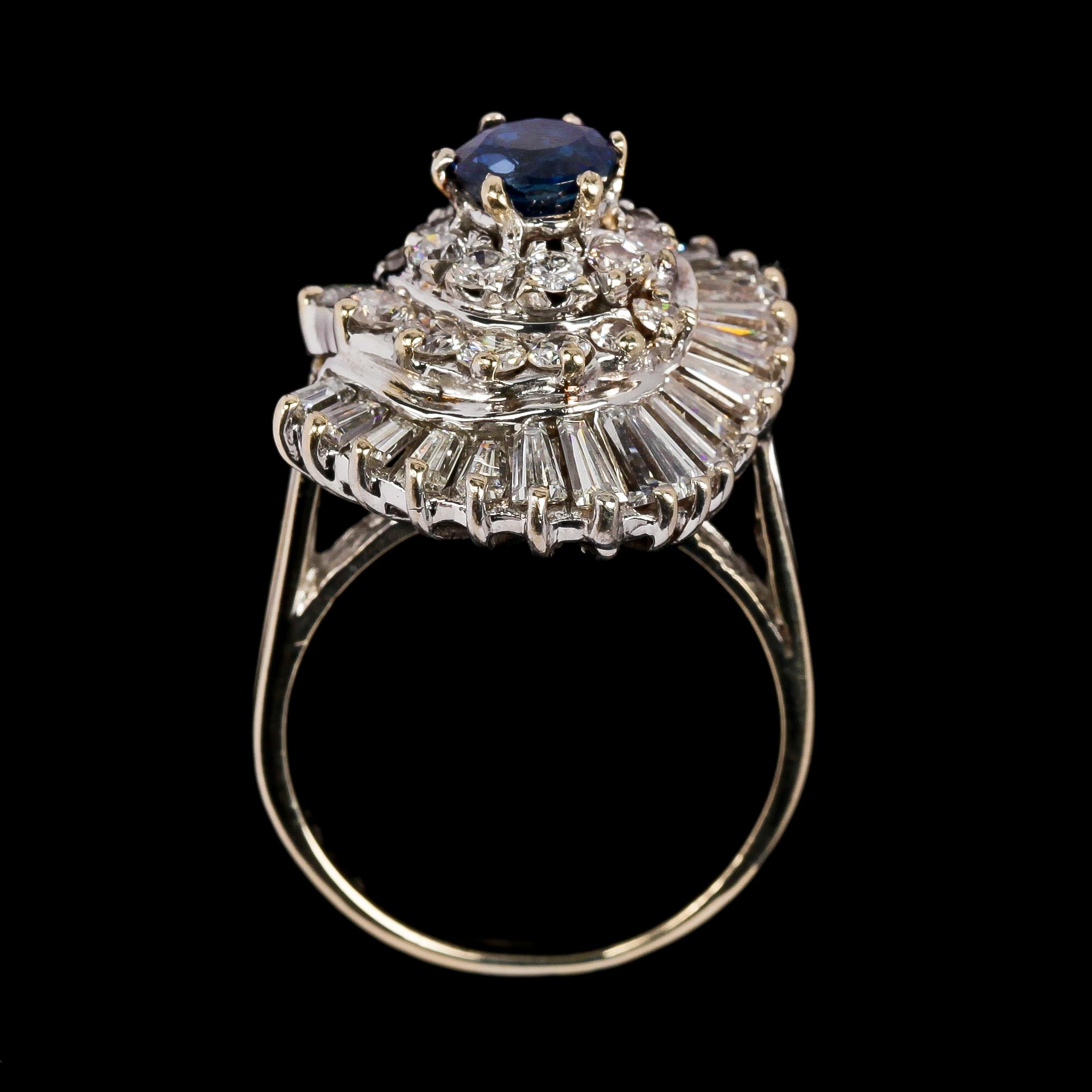 RING, blå safir, ca 1 ct samt briljant- och baguettslipade diamanter, tot. ca 2 ct.