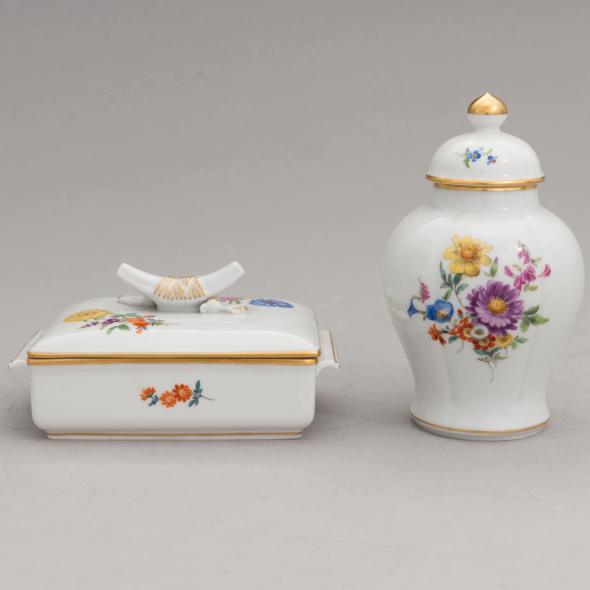 Two Meissen porcelain vases, a platter, an urn and a lidded box from the latter half of 20th century.