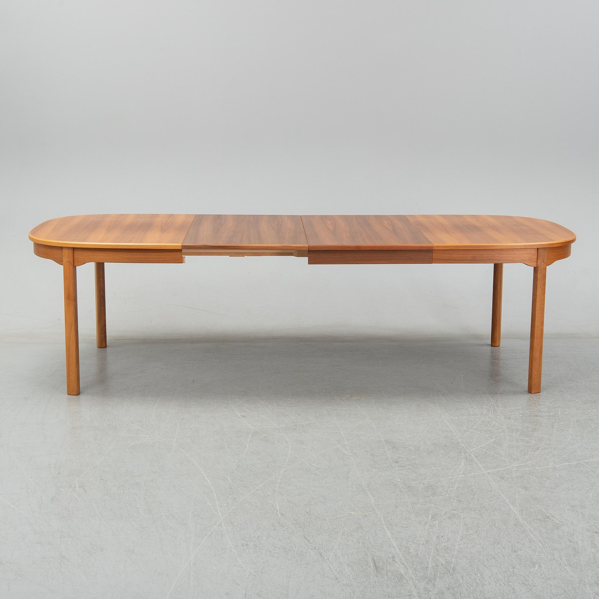 An 'Ambassador' dining table by Carl Malmsten, Åfors.