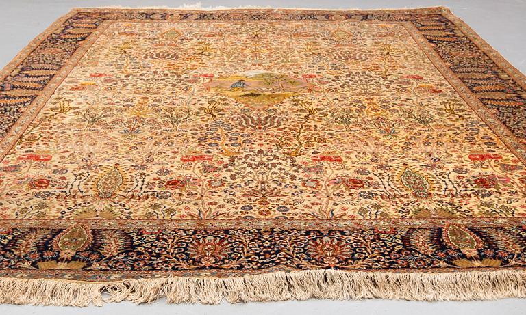 A CARPET, a semi-antique Tabriz probably, figural, ca 325,5 x 226 cm.