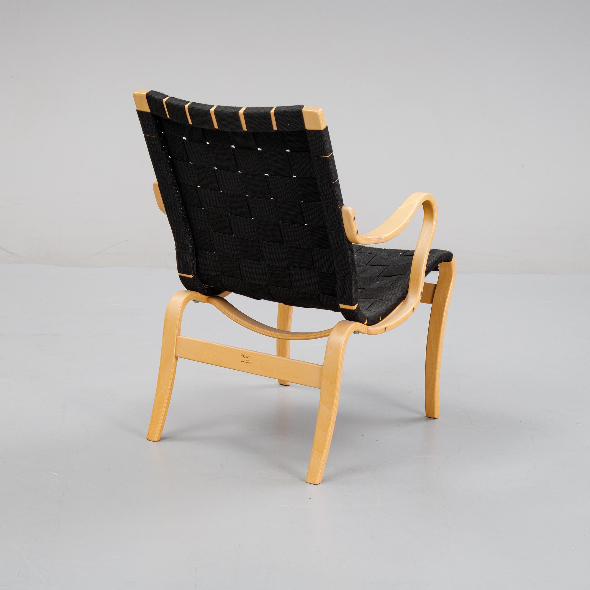 A 'Mina' armchair by Bruno Mathsson for Mathsson International.