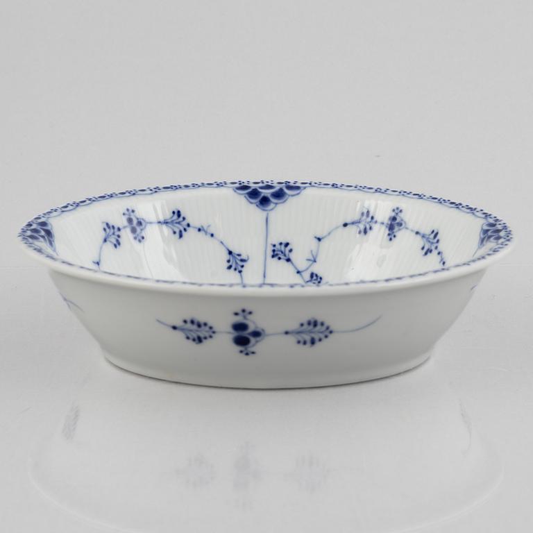 Four porcelain pieces of half lace "Musselmalet", Royal Copenhagen, Denmark, 1894-1945.