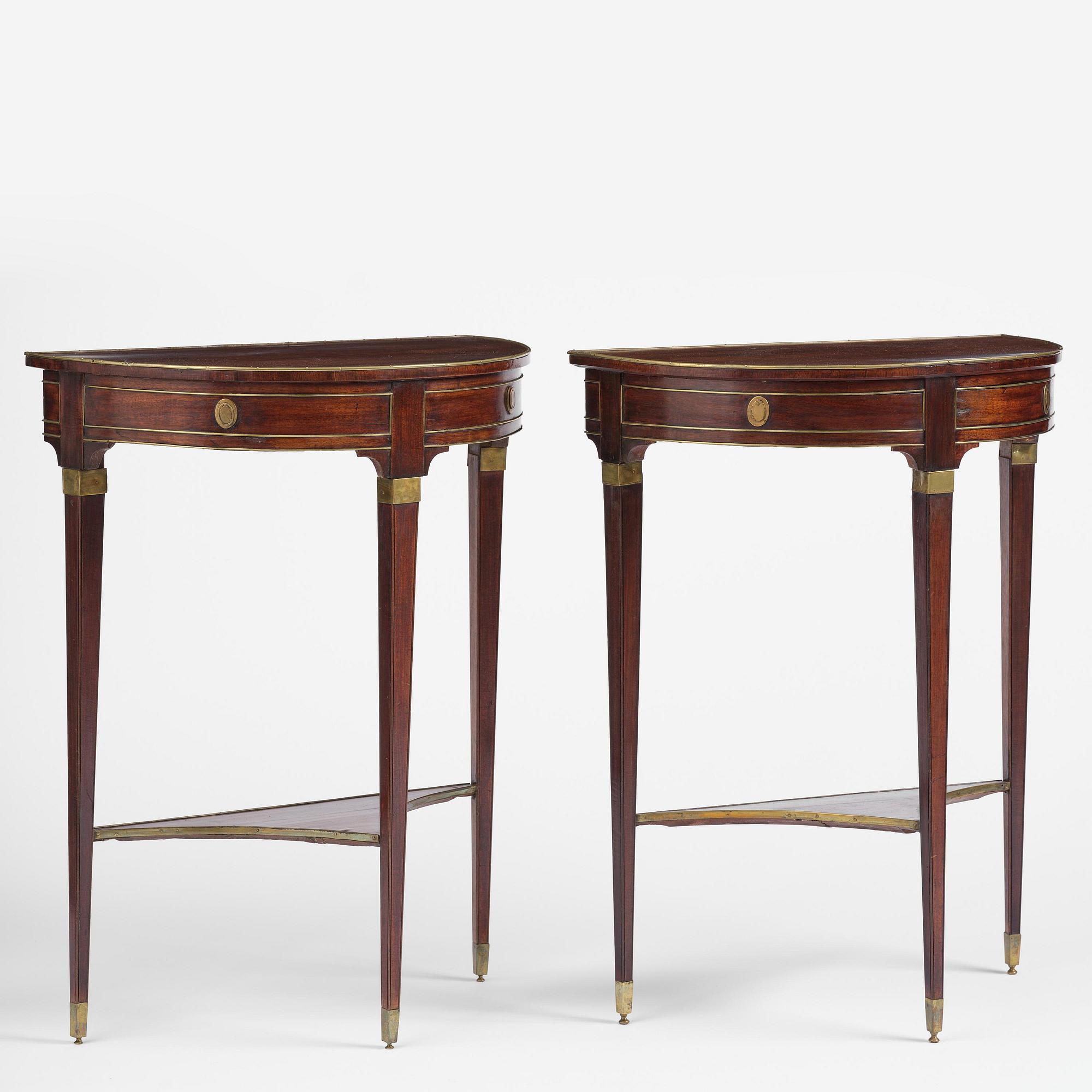 A pair of late Gustavian mahogany consoles in the manner of A. Lundelius, Stochkolm, late 18th century.