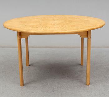 a 'Svitjod' dining table by Göran Malmvall for Karl Andersson & söner.