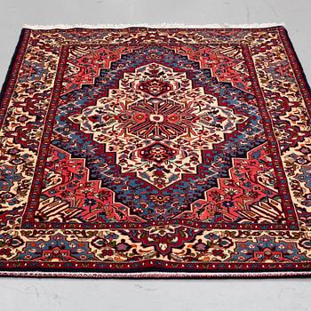 A carpet, Hamadan 200 x 134 cm.